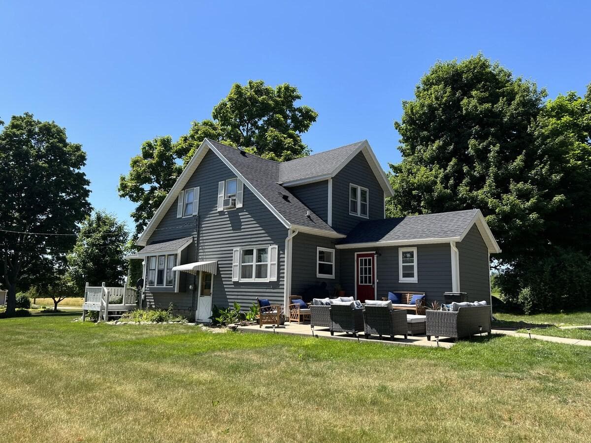 Outdoor patio with furniture for seating.